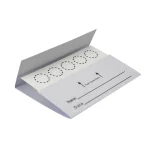 White folded card with a row of six dashed circles on a strip, plus form fields for Name and Date and the note 'Tuck Cover Here' with arrows.903 HCY DNA Blood COLLECTION CARD