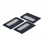 Three black rectangular calibration cards with circular target diagrams and a dotted pattern, laid on a white background.DBS 903 DNA Card